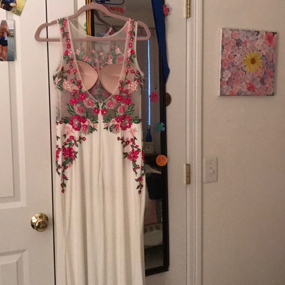 White lprom dress with pink flower detail